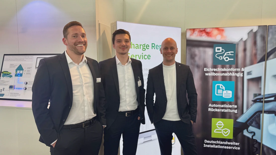 Phoenix Contact employees Anton Schönenberg, Robert Bieber, and Mathias Weßelmann at the Flotte! Der Branchentreff.